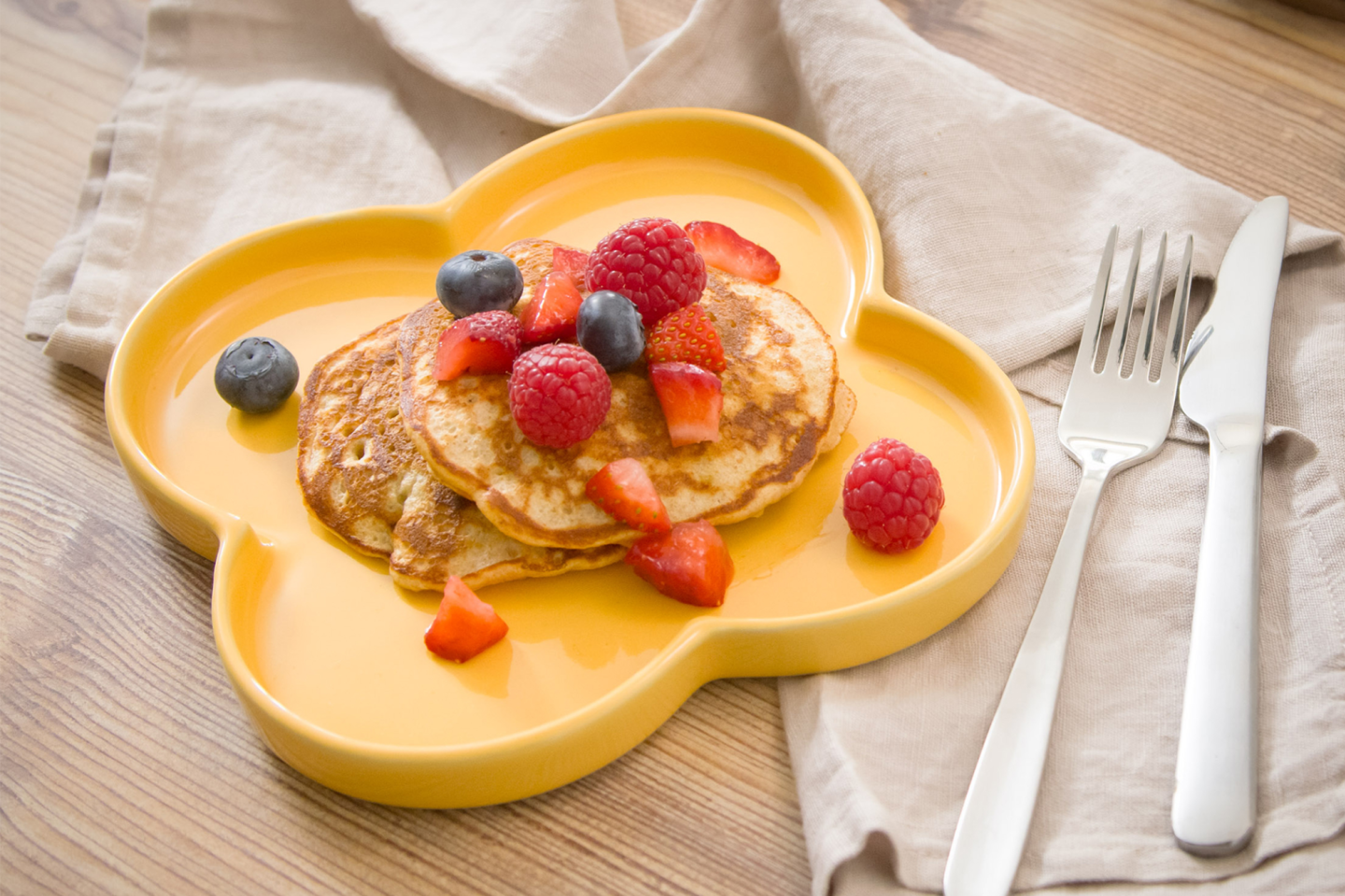 Banana pancakes topped with berries