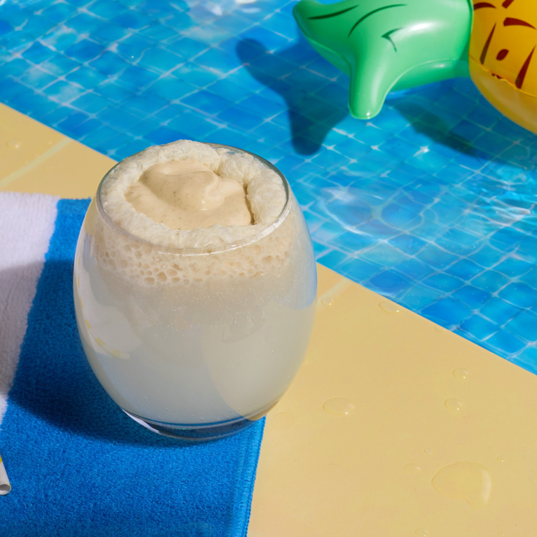 Banana float iced drink by the pool Banana float iced drink by the pool