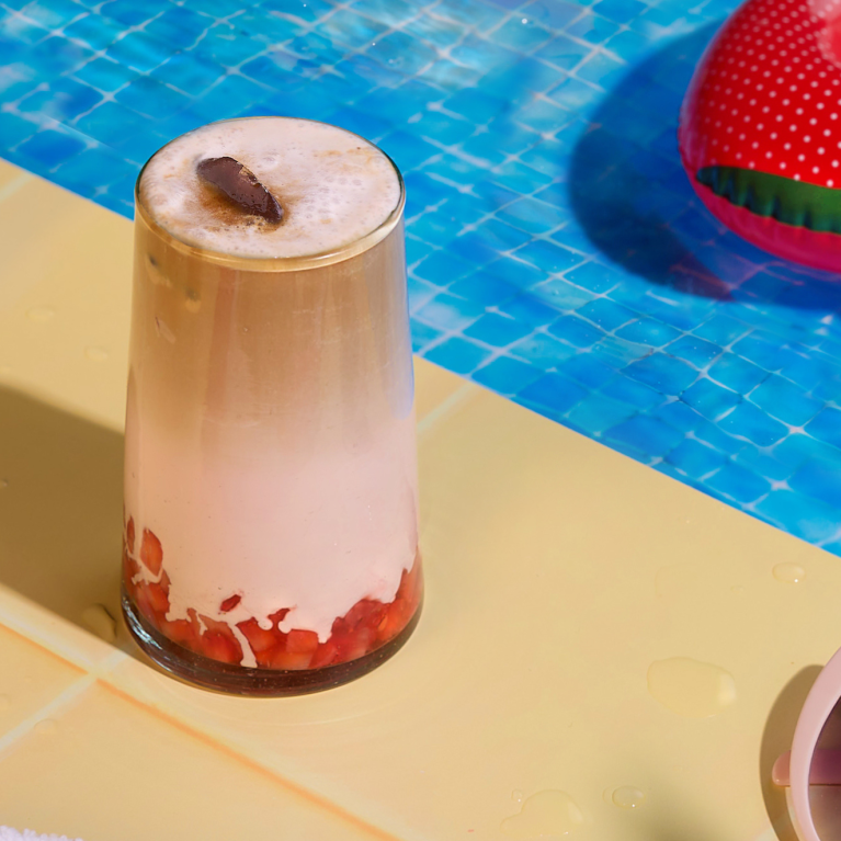 Iced strawberry latte by the pool Iced strawberry latte by the pool