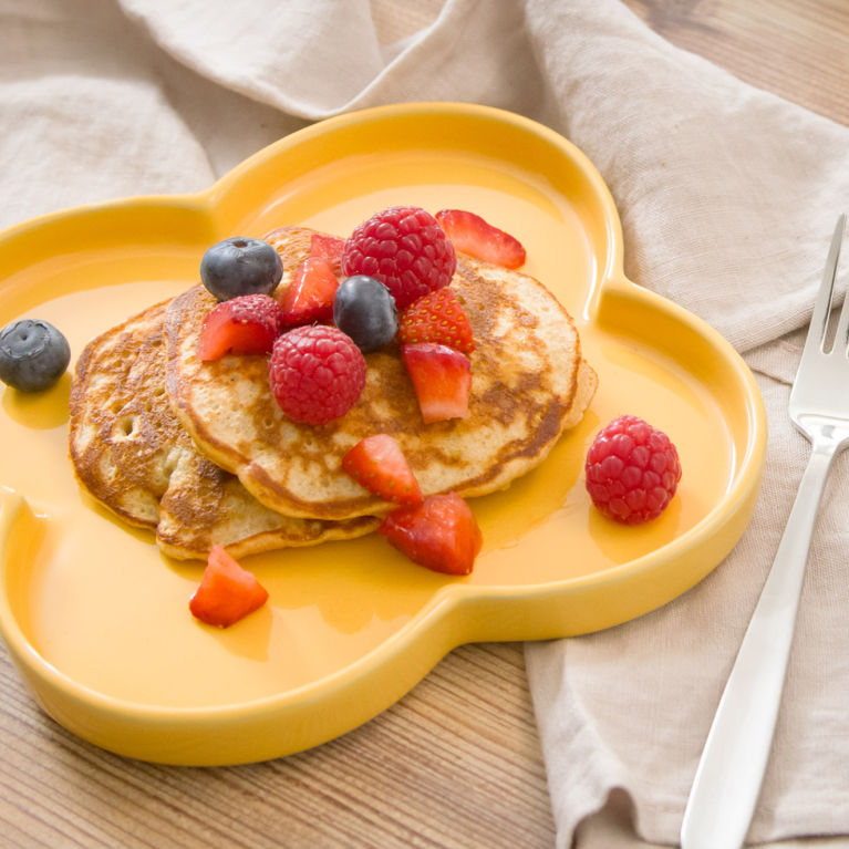 Banana pancakes topped with berries