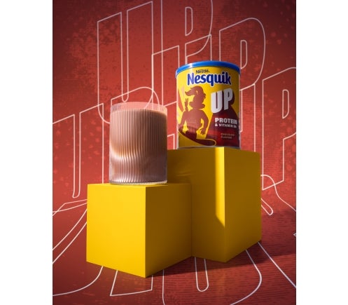 Nesquik UP with glass of chocolate milk