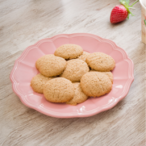 Strawberry cookies on pink plate