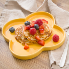 Banana pancakes topped with berries